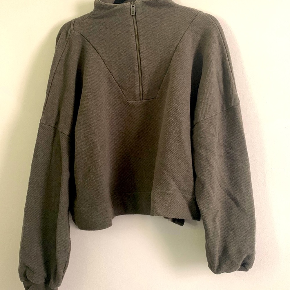 green sweatshirt with zip